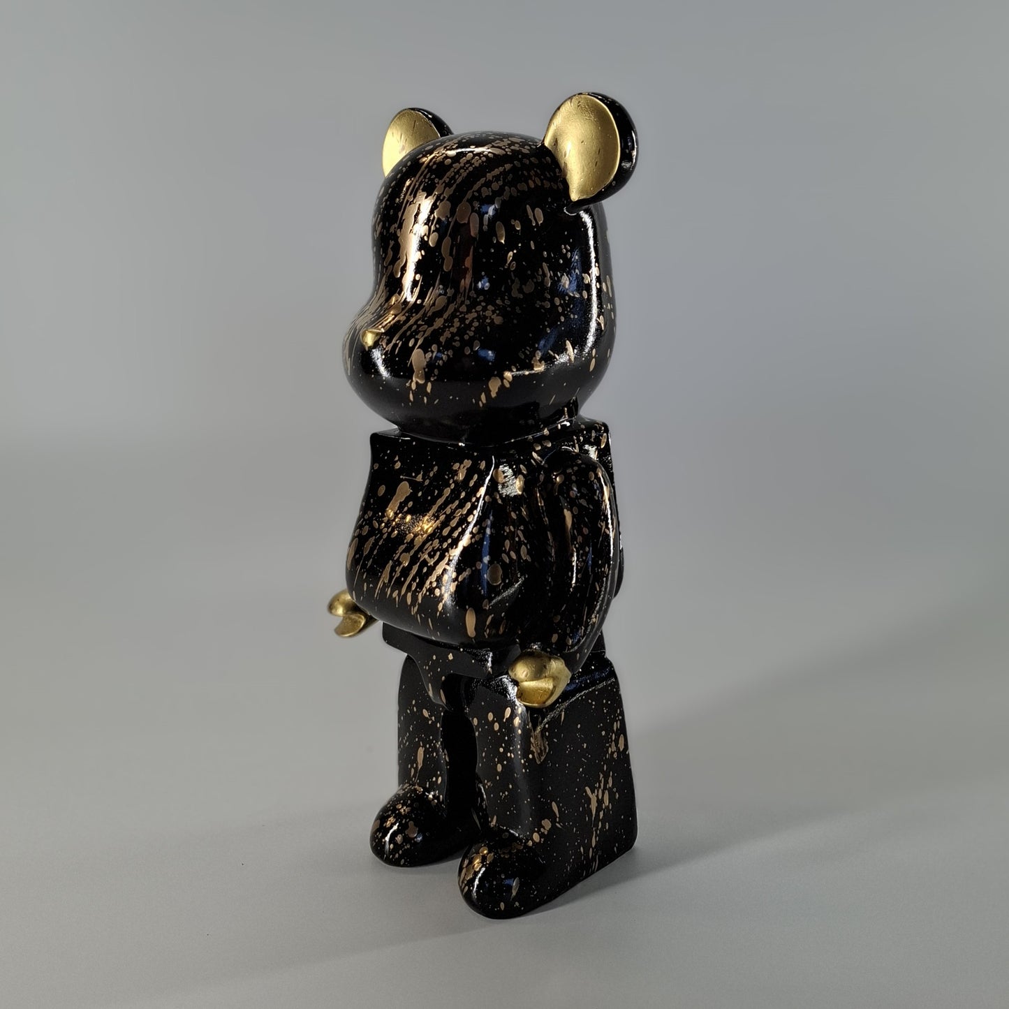 Beer staand zwart goud splash 26 cm