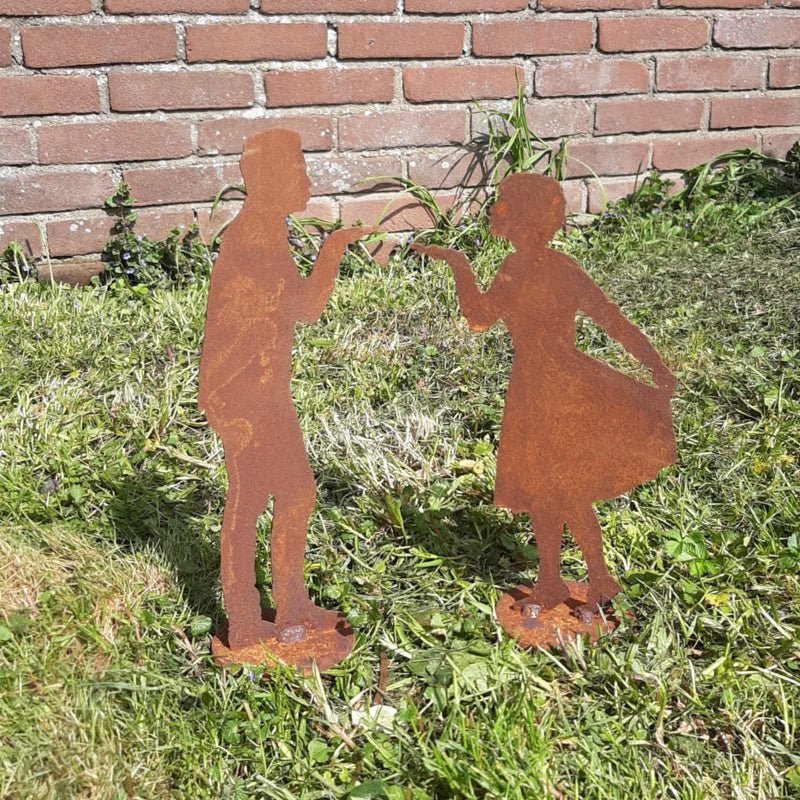 Luchtzoentje vrouw op plaat roestijzer