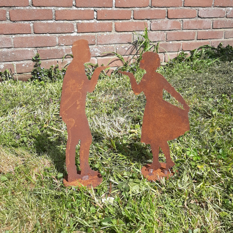 Luchtzoentje van man op plaat Roestijzer