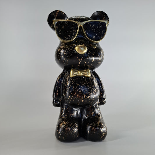 Beer staand met zonnebril zwart goud splash 27 cm