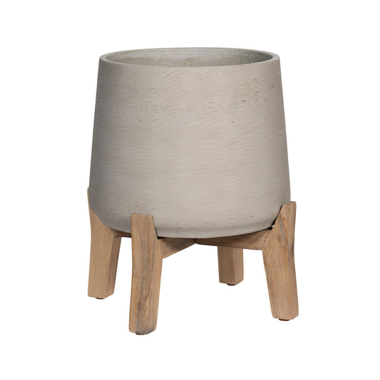 Lage grijze plantenpot op korte pootjes van Pottery Pots, model Patt XL – gemaakt van fiberclay, geschikt voor binnen en buiten, met robuuste gewassen afwerking.